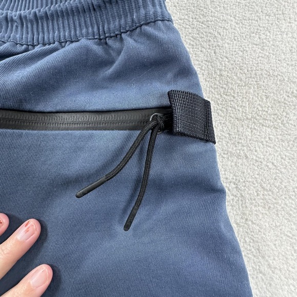 nike tech pack cropped woven pants